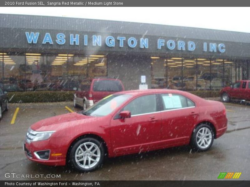 Sangria Red Metallic / Medium Light Stone 2010 Ford Fusion SEL