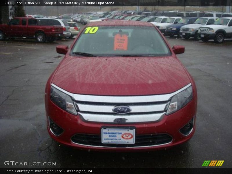 Sangria Red Metallic / Medium Light Stone 2010 Ford Fusion SEL