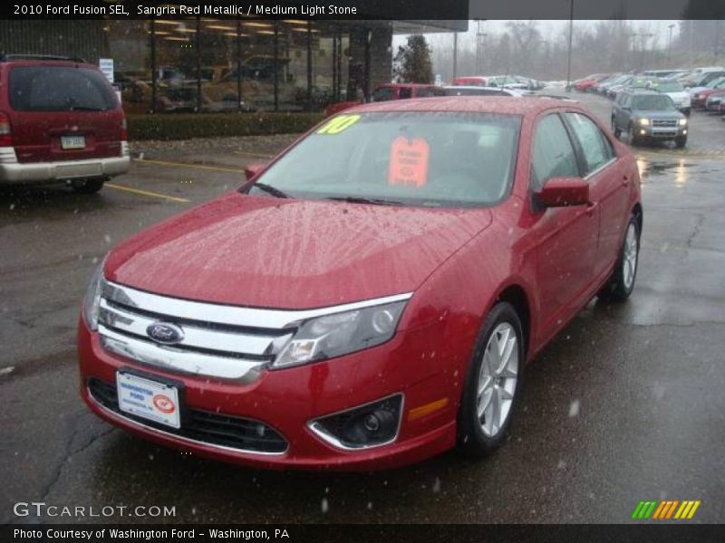 Sangria Red Metallic / Medium Light Stone 2010 Ford Fusion SEL