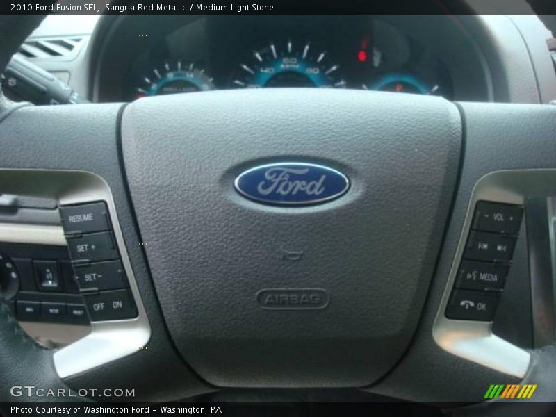 Sangria Red Metallic / Medium Light Stone 2010 Ford Fusion SEL