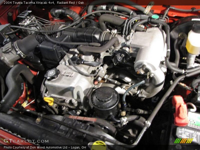 Radiant Red / Oak 2004 Toyota Tacoma Xtracab 4x4