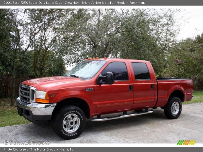 Bright Amber Metallic / Medium Parchment 2001 Ford F250 Super Duty Lariat Super Crew 4x4