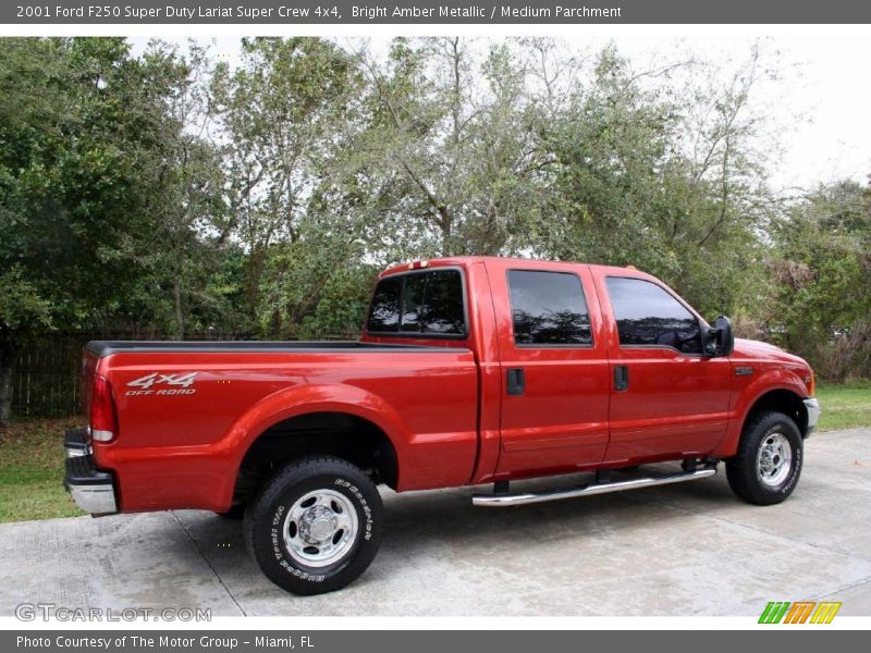 Bright Amber Metallic / Medium Parchment 2001 Ford F250 Super Duty Lariat Super Crew 4x4