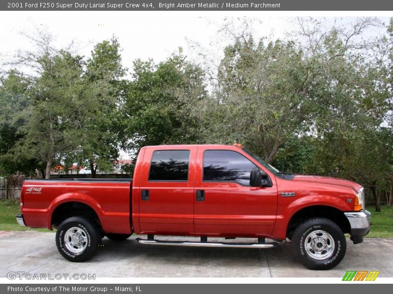 Bright Amber Metallic / Medium Parchment 2001 Ford F250 Super Duty Lariat Super Crew 4x4