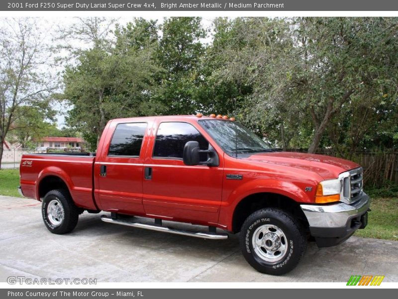 Bright Amber Metallic / Medium Parchment 2001 Ford F250 Super Duty Lariat Super Crew 4x4