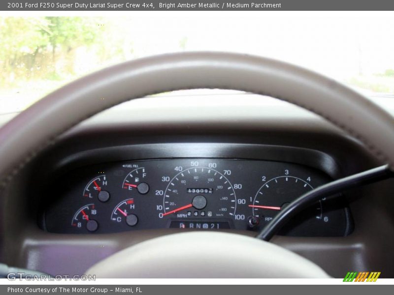 Bright Amber Metallic / Medium Parchment 2001 Ford F250 Super Duty Lariat Super Crew 4x4