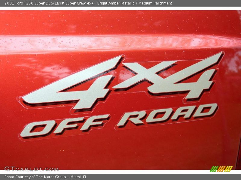 Bright Amber Metallic / Medium Parchment 2001 Ford F250 Super Duty Lariat Super Crew 4x4