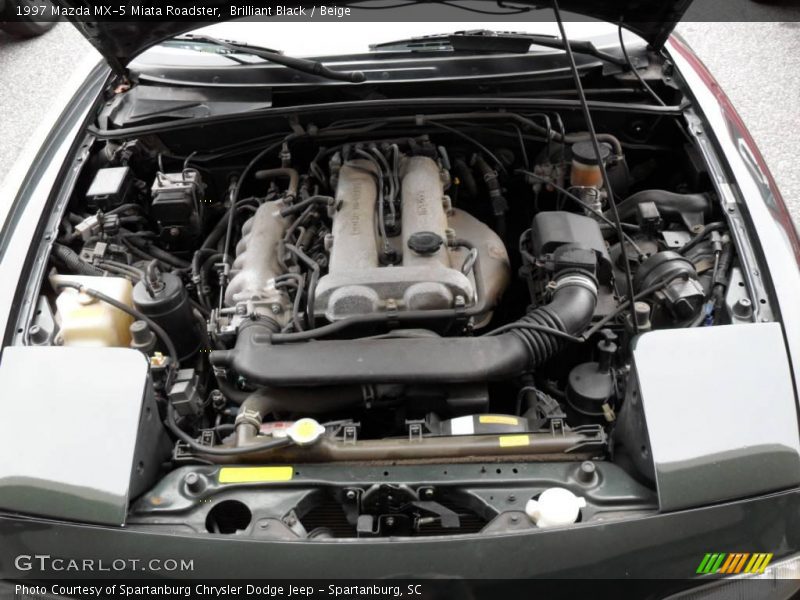 Brilliant Black / Beige 1997 Mazda MX-5 Miata Roadster