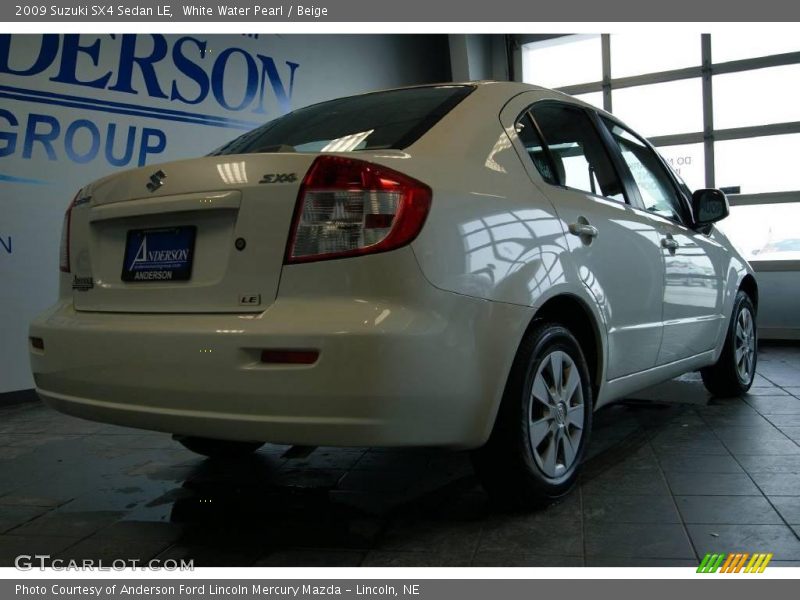 White Water Pearl / Beige 2009 Suzuki SX4 Sedan LE
