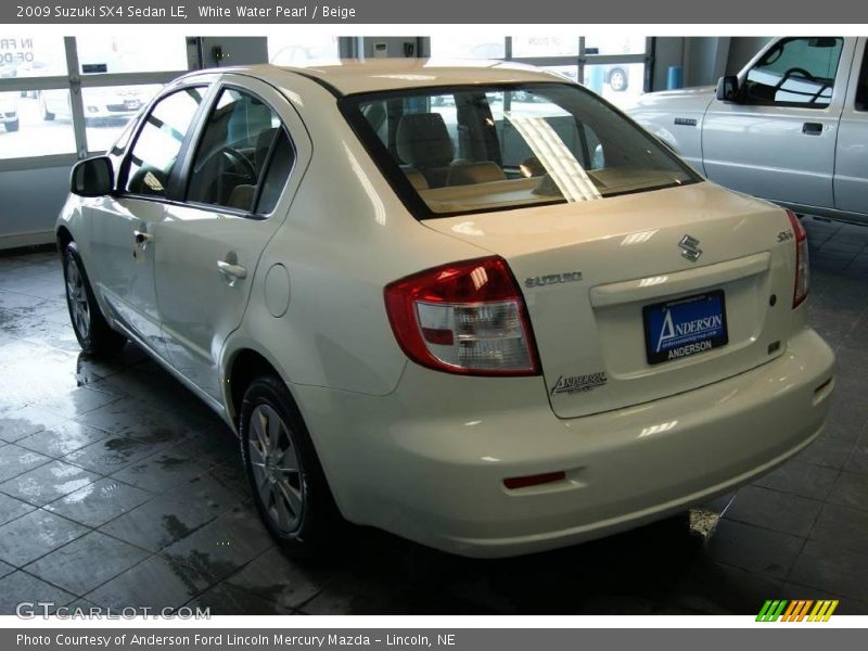 White Water Pearl / Beige 2009 Suzuki SX4 Sedan LE
