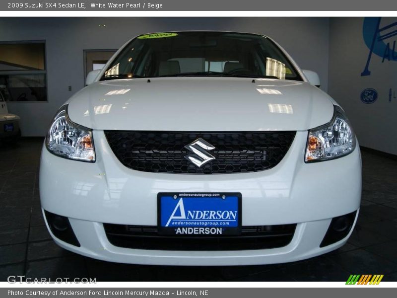 White Water Pearl / Beige 2009 Suzuki SX4 Sedan LE