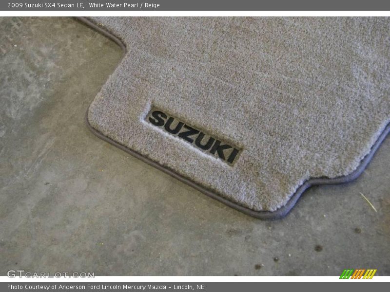White Water Pearl / Beige 2009 Suzuki SX4 Sedan LE