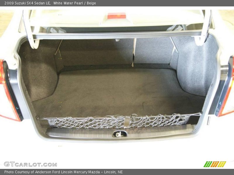 White Water Pearl / Beige 2009 Suzuki SX4 Sedan LE