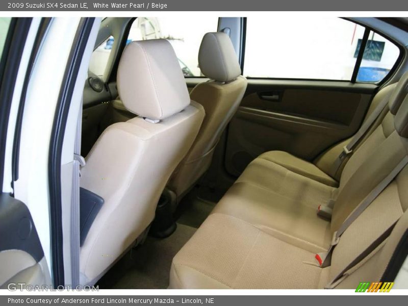 White Water Pearl / Beige 2009 Suzuki SX4 Sedan LE