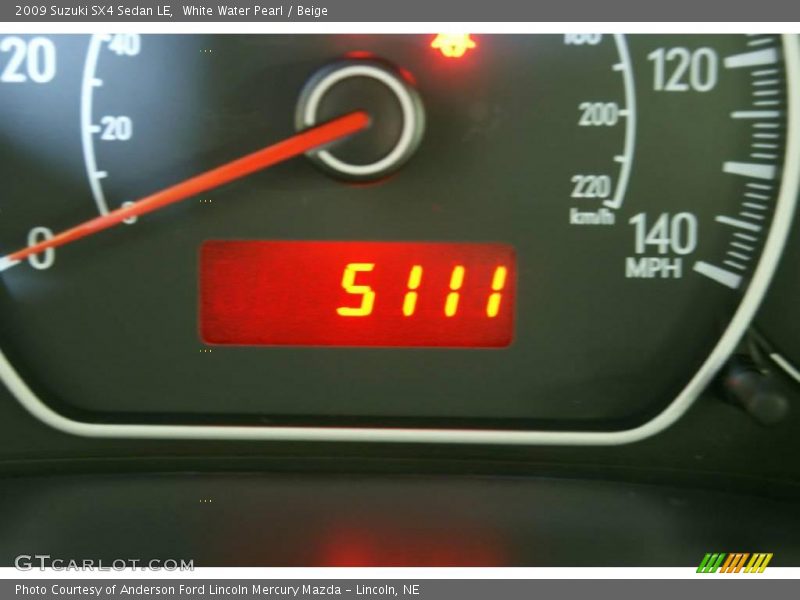 White Water Pearl / Beige 2009 Suzuki SX4 Sedan LE