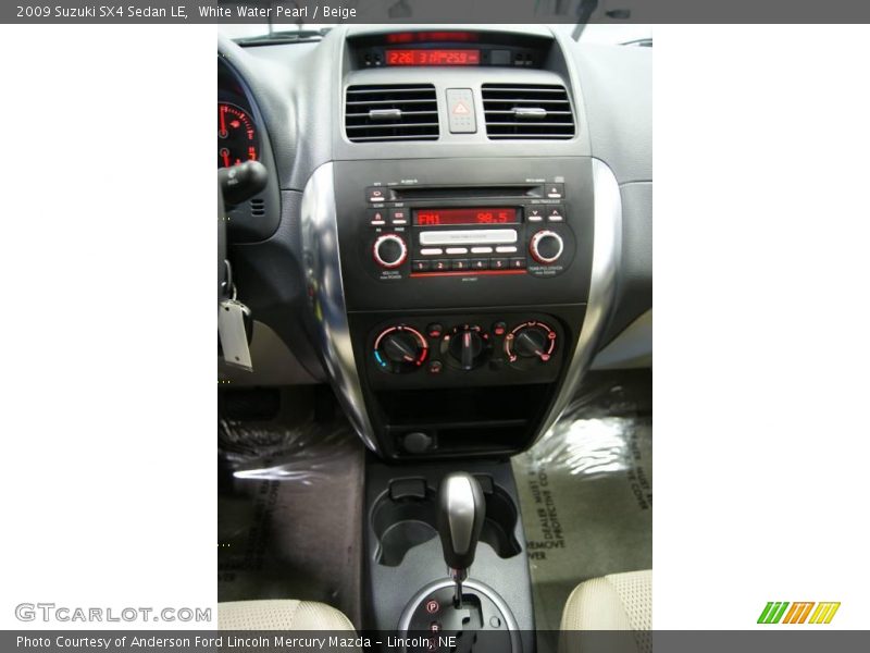 White Water Pearl / Beige 2009 Suzuki SX4 Sedan LE