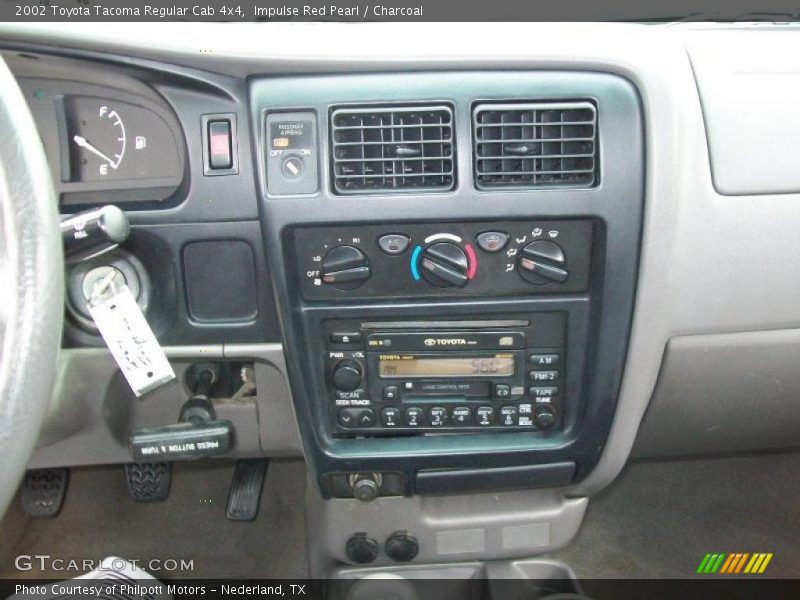 Impulse Red Pearl / Charcoal 2002 Toyota Tacoma Regular Cab 4x4