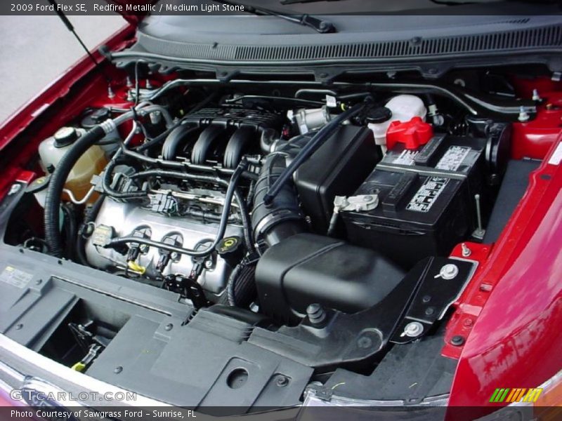 Redfire Metallic / Medium Light Stone 2009 Ford Flex SE