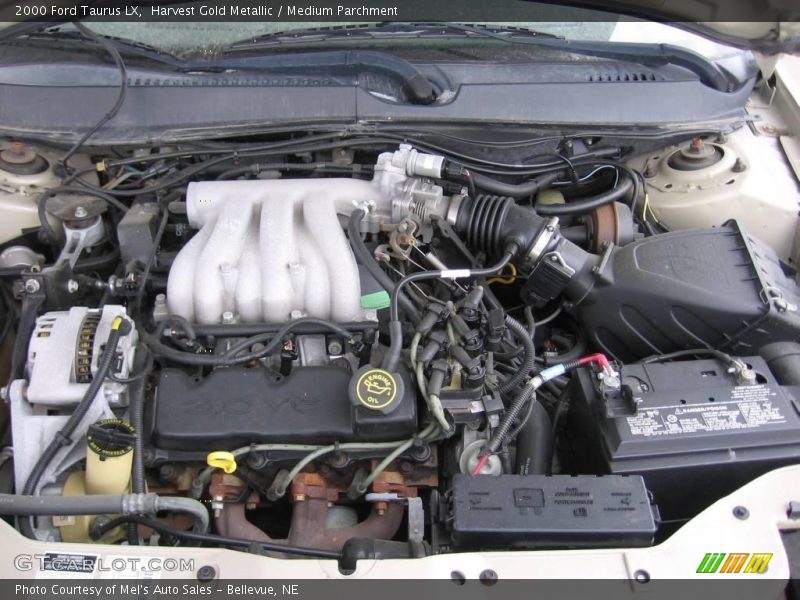 Harvest Gold Metallic / Medium Parchment 2000 Ford Taurus LX