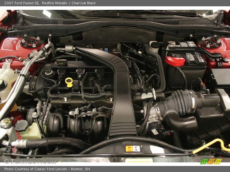 Redfire Metallic / Charcoal Black 2007 Ford Fusion SE