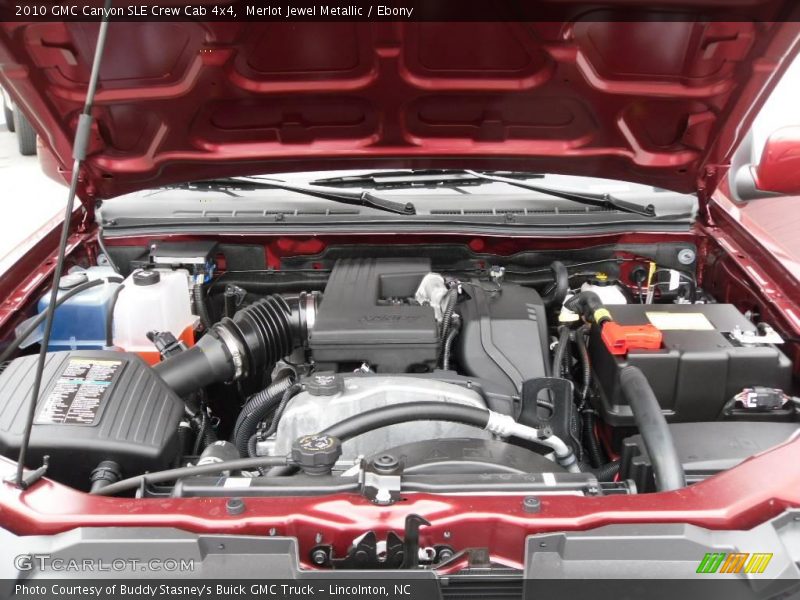 Merlot Jewel Metallic / Ebony 2010 GMC Canyon SLE Crew Cab 4x4