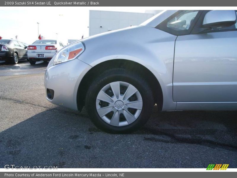 Quicksilver Metallic / Black 2009 Suzuki SX4 Sedan LE