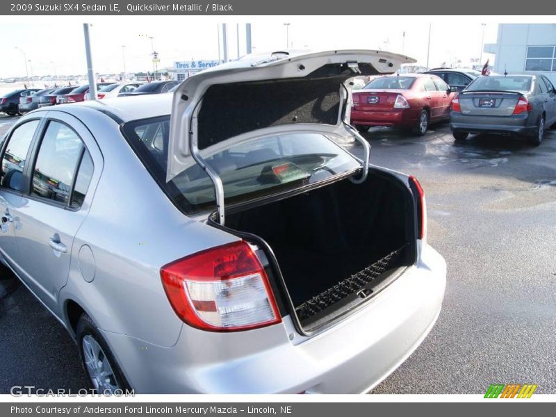 Quicksilver Metallic / Black 2009 Suzuki SX4 Sedan LE