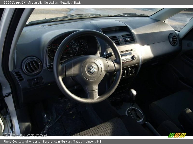 Quicksilver Metallic / Black 2009 Suzuki SX4 Sedan LE