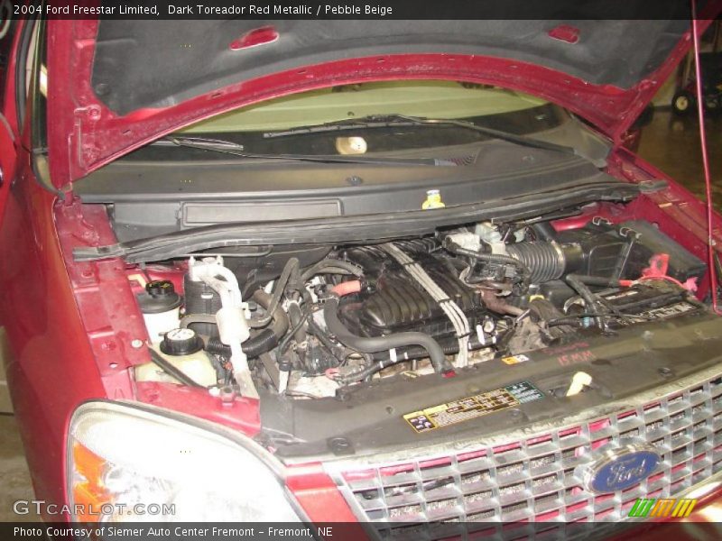 Dark Toreador Red Metallic / Pebble Beige 2004 Ford Freestar Limited