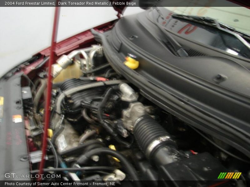 Dark Toreador Red Metallic / Pebble Beige 2004 Ford Freestar Limited