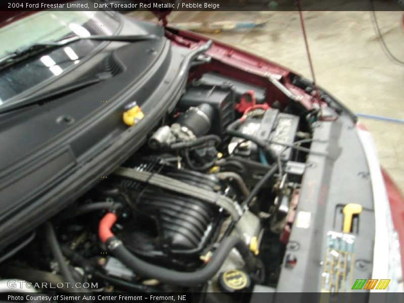 Dark Toreador Red Metallic / Pebble Beige 2004 Ford Freestar Limited