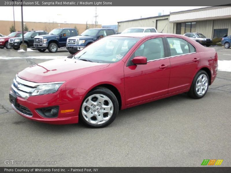 Sangria Red Metallic / Medium Light Stone 2010 Ford Fusion SE