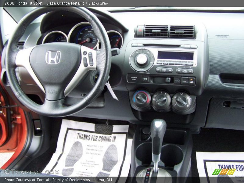 Blaze Orange Metallic / Black/Grey 2008 Honda Fit Sport