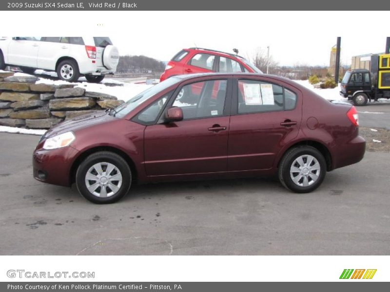 Vivid Red / Black 2009 Suzuki SX4 Sedan LE