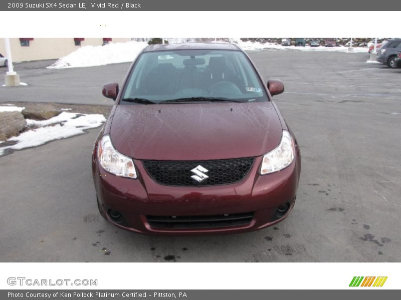 Vivid Red / Black 2009 Suzuki SX4 Sedan LE