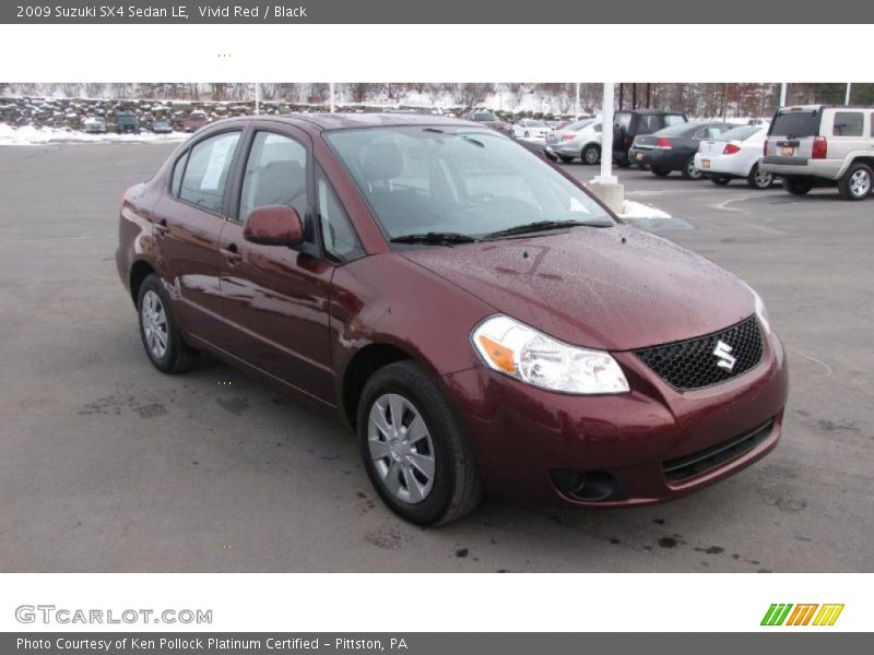 Vivid Red / Black 2009 Suzuki SX4 Sedan LE