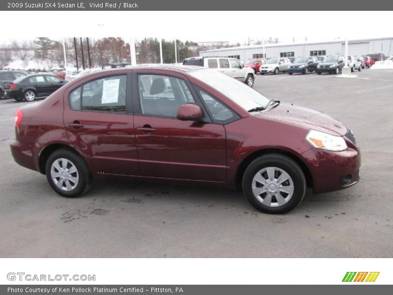 Vivid Red / Black 2009 Suzuki SX4 Sedan LE