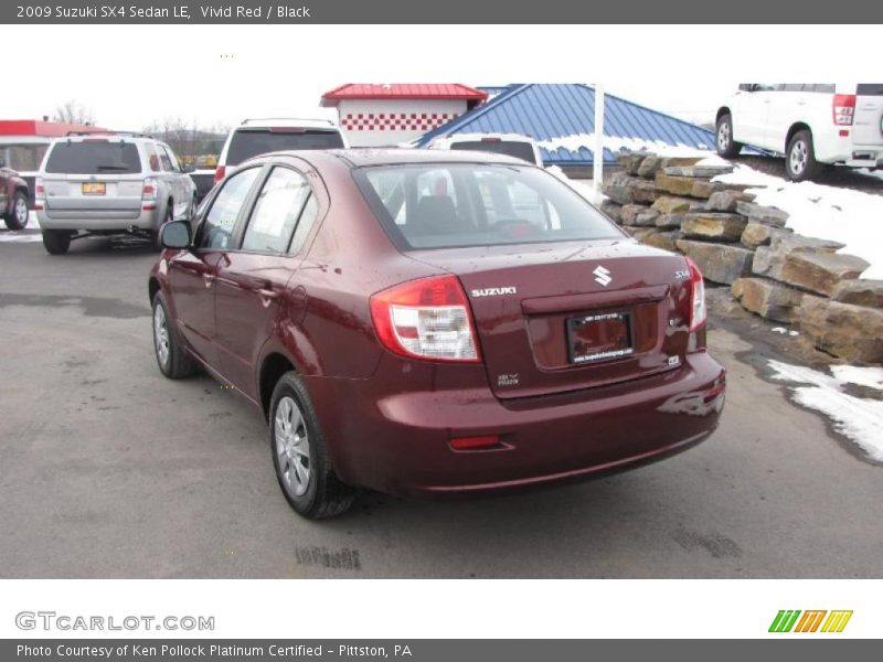 Vivid Red / Black 2009 Suzuki SX4 Sedan LE