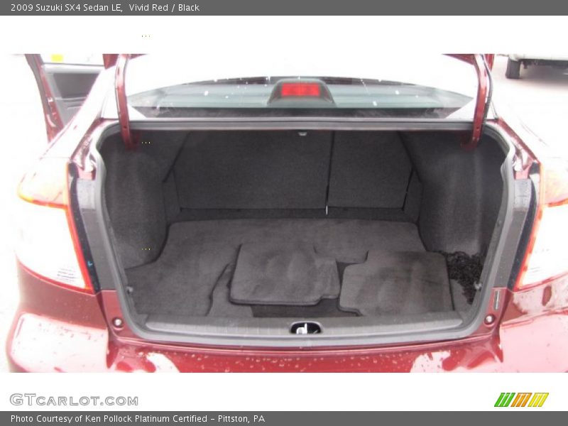 Vivid Red / Black 2009 Suzuki SX4 Sedan LE