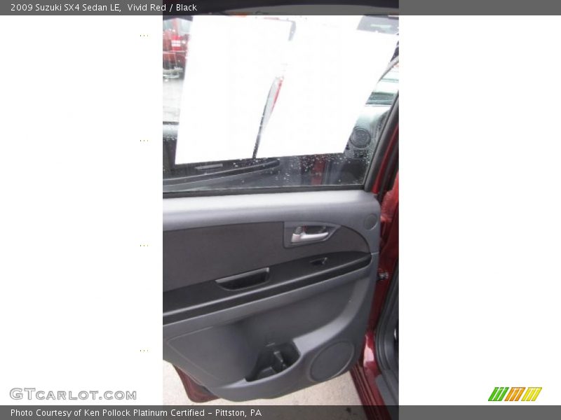 Vivid Red / Black 2009 Suzuki SX4 Sedan LE