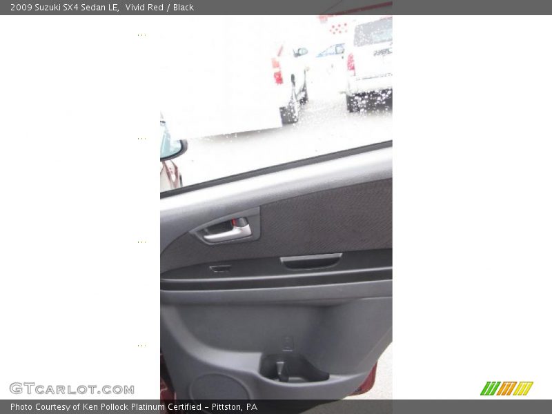 Vivid Red / Black 2009 Suzuki SX4 Sedan LE