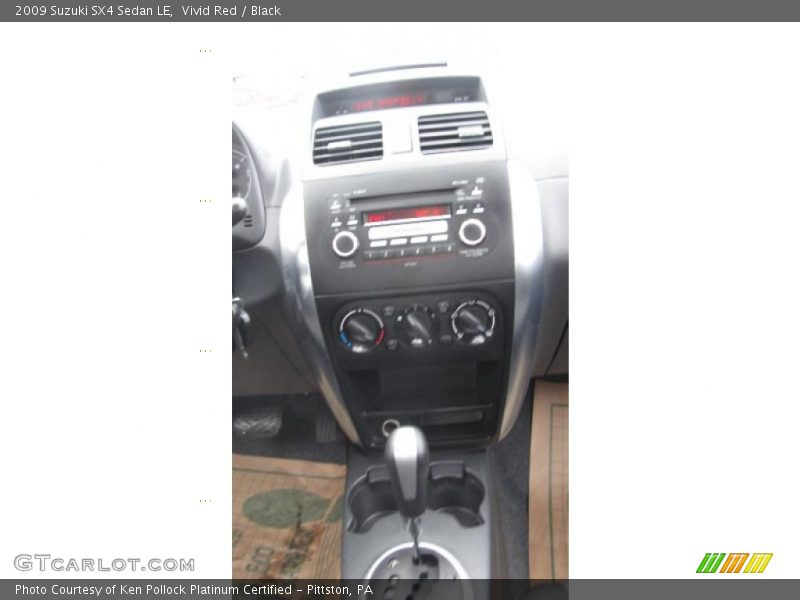 Vivid Red / Black 2009 Suzuki SX4 Sedan LE