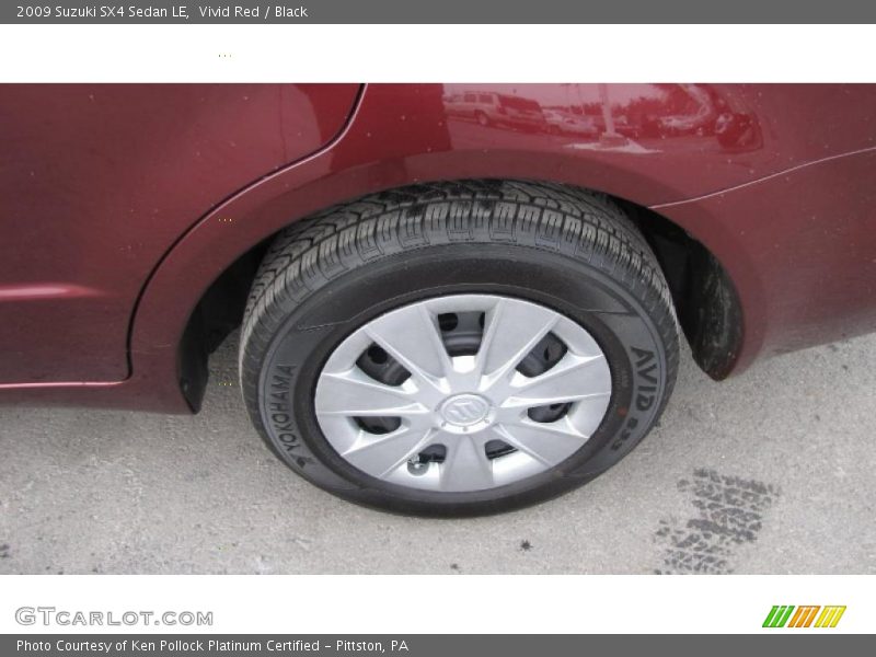 Vivid Red / Black 2009 Suzuki SX4 Sedan LE