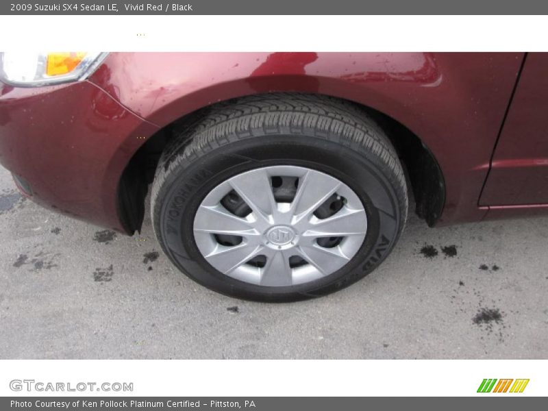 Vivid Red / Black 2009 Suzuki SX4 Sedan LE