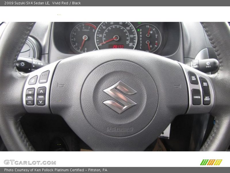 Vivid Red / Black 2009 Suzuki SX4 Sedan LE