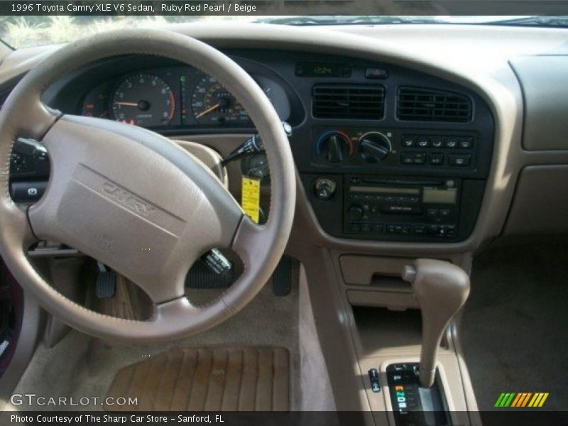 Ruby Red Pearl / Beige 1996 Toyota Camry XLE V6 Sedan