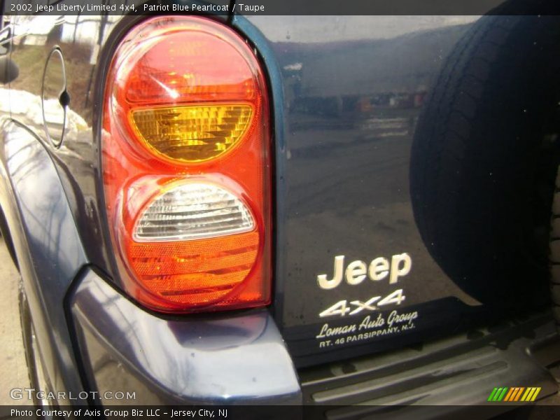 Patriot Blue Pearlcoat / Taupe 2002 Jeep Liberty Limited 4x4