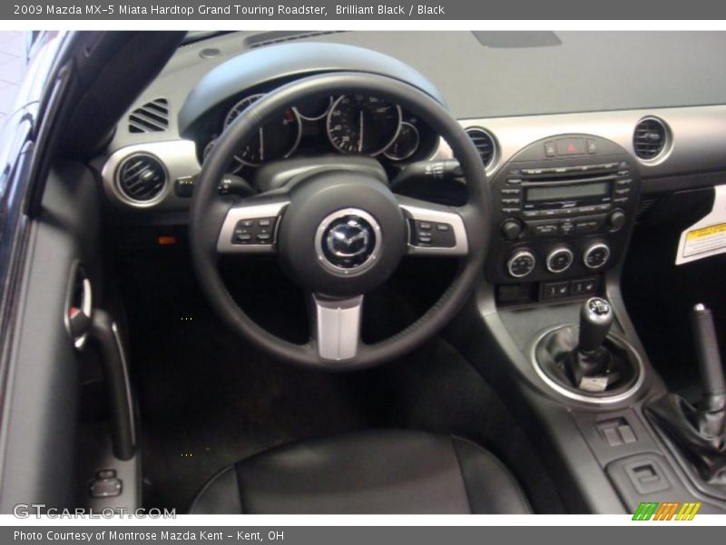 Brilliant Black / Black 2009 Mazda MX-5 Miata Hardtop Grand Touring Roadster