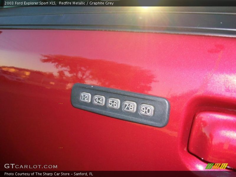Redfire Metallic / Graphite Grey 2003 Ford Explorer Sport XLS