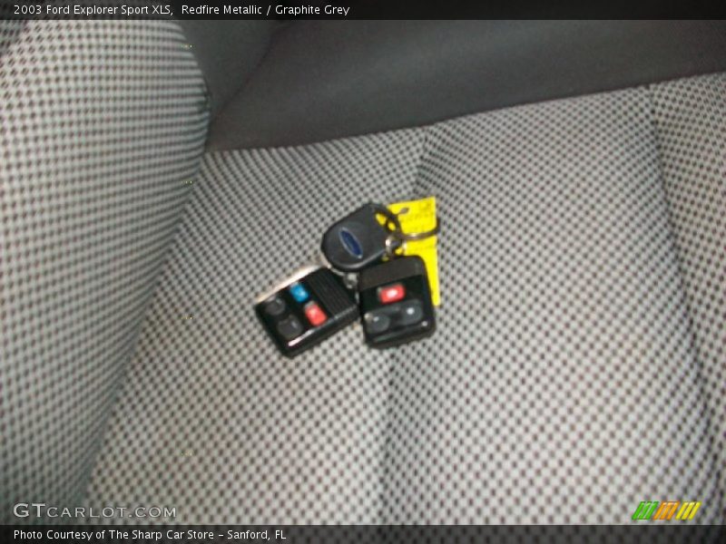 Redfire Metallic / Graphite Grey 2003 Ford Explorer Sport XLS